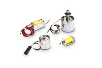 A selection of 4 solenoid components including wiring